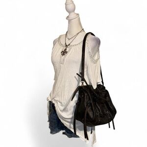 White Sleeveless Top with Black Bag